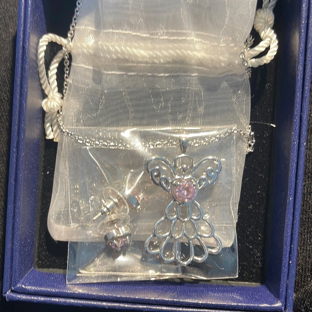 Brand new silver necklace and earrings